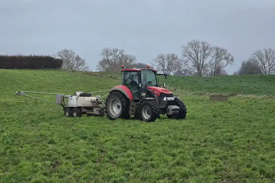 Dave tows his Tow and Fert Multi 1000 across a paddock on his dairy farm in Cambridge, NZ.